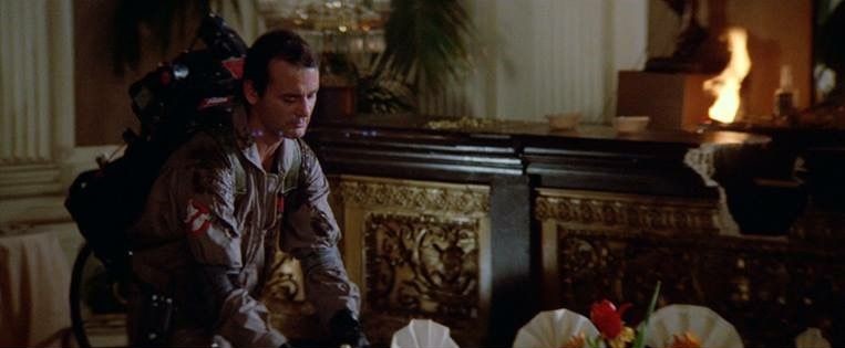 Ray pulling off the tablecloth.